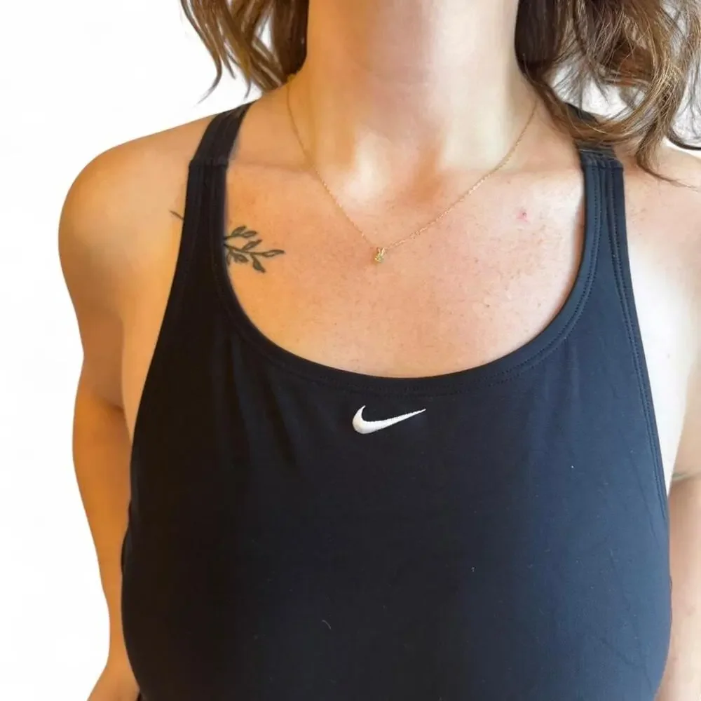 Nike black one piece swimsuit fits like a medium